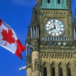 Canadian parliament building and Canadian flag
